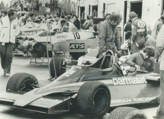 Pit activity around John Watson's Brabham Alfa Romeo is frantic during qualifying session at Montral Grand Prix yesterday