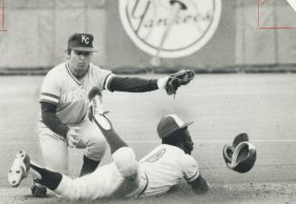 Jay's rookie Alfredo Griffin is out at second on tag by Royals' shortstop Freddie Patek
