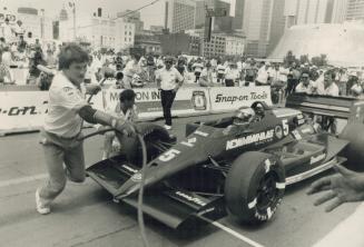 Pit crews for Indy-type cars entered in Sunday's race at Exhibition Place got in some practice yesterday as part of a race promotion on Wellington Str(...)