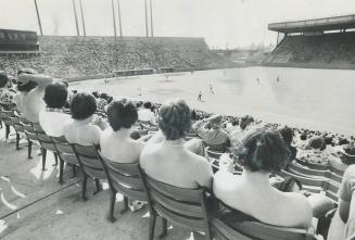 It's bareback at the ballpark. The best place in Metro to get a pre-summer tan - if you're a baseball nut - is in the seats along first-base line at E(...)