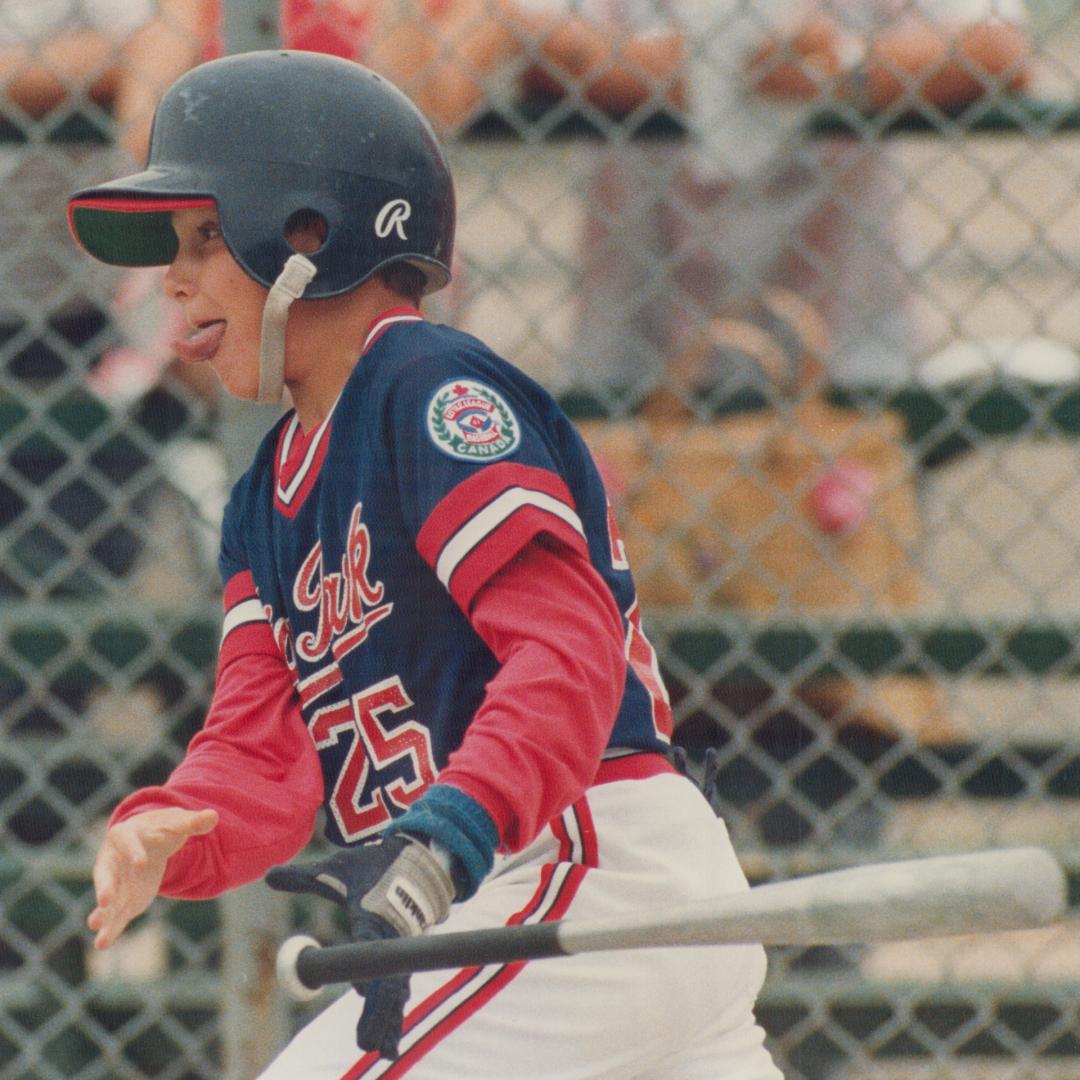 Mike Jurkiewicz, third baseman for High Park Little League team, gives it his all and them some as he lashes out a single to help his team to 4-1 win (...)
