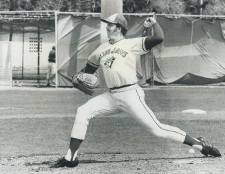 Religion was his relief. Dennis DeBarr, a 24-year-old relief pitcher with the Blue Jays, works out in a training session at the Jays' camp in Dunedin,(...)