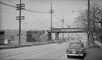 Yonge Street, looking north from south of Merton Street, Toronto, Ontario. Image shows a street ...