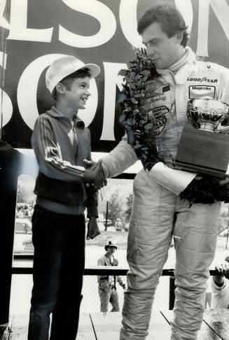 Bill Harrington, 11, one of nearly 10,000 Star carriers at Mosport, got to meet Can-Am race champion Patrick Tambay of France