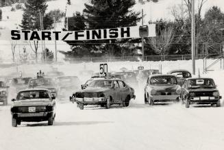 Other racers (below) engage in some nail-biting excitement gently guiding their machines around the slippery track