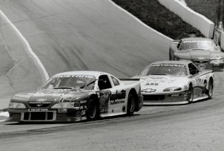 Power train: Camaro ace Ron Fellows of Toronto spent much of last Sunday's Trans-Am clash sandwiched between the Mustangs of race winner Dorsey Schroeder (left) and Boris Said
