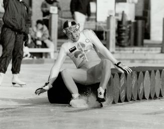 Quebec's Yvon Jolin Jr. looks a sure bet, top, but misses the 16th barrell and is left writhing on the ice at yesterday's Harbourfront TropiCanada fes(...)