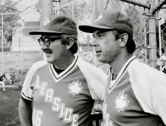 Watchful eyes: Leaside manager Ric Fleury (right) and Sam Leonard Keep a watchful eye on their team