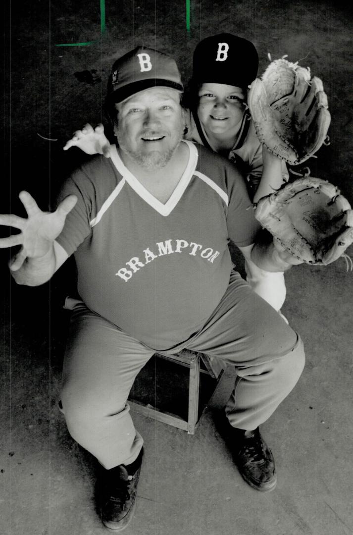 They're back! Dave Jackson and son Lory, 9, were thrown out of SkyDome Wednesday for interference but are at today's game