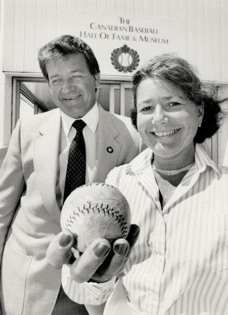 Here's the pitch: Anne Logan, who kept a baseball signed by Babe Ruth after her divorce, wants to give it to Canadian Baseball Hall of Fame president Bruce Prentice, behind her