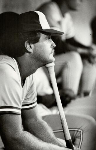Right: Jeff Burroughs gets support from a designated hitter's best friend