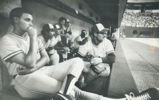 Jimmy Key seems lost in thought as Dennis Lamp, Tom Henke and Jeff Hearron note something afield