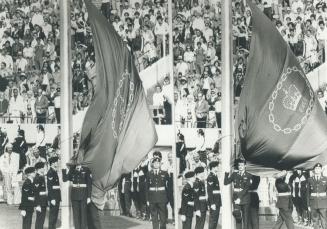 Edmonton. Aug 11th. Embarrasing moments. When the flag of the Commonwealth Games was lowered during the closing ceremonies one of the guard of honour (...)