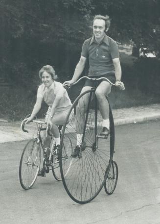 On a penny farthing from his collection of antique bicycles, Mike Barry of onsmount Dr. cycles beside his wife, Clare, on one of her three bicycles. I(...)