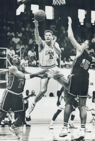 Canada's Mike Smrek moves in for a layup at Varsity Arena