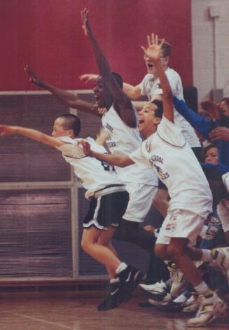 Wildly ecstatic: Park School Panthers celebrate their 37-30 victory over Kent Public School yesterday in Toronto boys' basketball final at Jarvis Collegiate