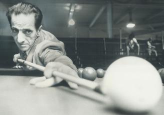 Trick-shot billiard artist Atomic Eddie Agha, who puts on a show several times a day in Leisure Time Pavilion at the Canadian National Exhibition, can(...)