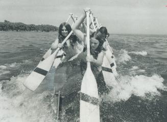 Paddling up a strom. Working out in preparation for their 67th annual regatta Saturday, members of Balmy Beach girls' war canoe churn up water. They a(...)