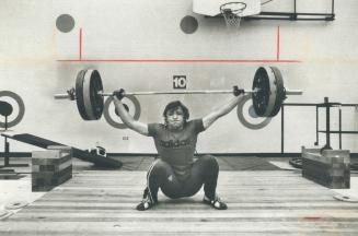 Gary Bratty works out for Canada's weight lifting team at the Commonwealth Games
