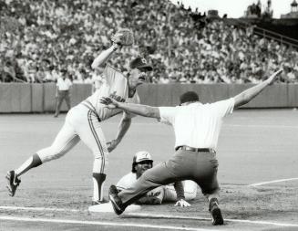Not this time, but. . . Seattle Mariners didn't get George Bell on this fourth inning pickoff attempt, but Bell was caught stealing as Jesse Barfield (...)