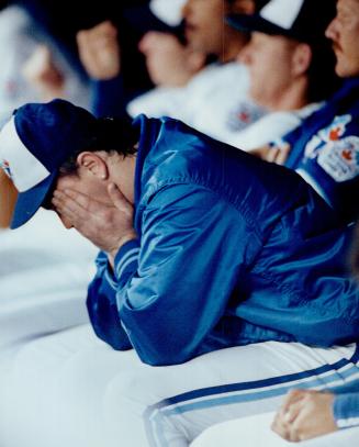 Oh no!: David Wells, one of five Jays throwers that the Minnesota Twins blew past at the SkyDome last night, buries his face after his 11/2 innings of work