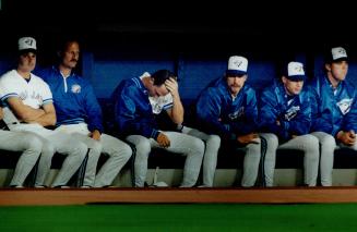 Misery loves company: Jimmy Key, trainer Tom Craig, David Cone, Jack Morris, Todd Stottlemyre and Bob MacDonald watch Jays lose another yesterday