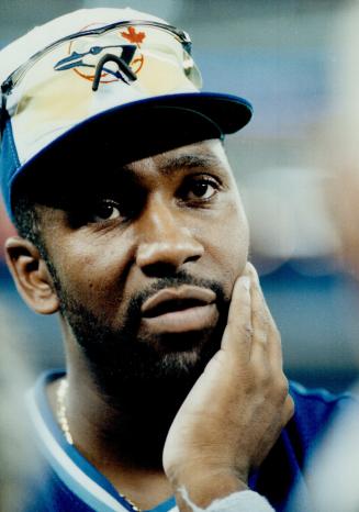 Jays star Joe Carter has a worried look, but fans at the SkyDome last night were ebuilient, even after back-to-back homers from Mark McGwire and Terry Steinbach put the visiting A's up 3-0 early