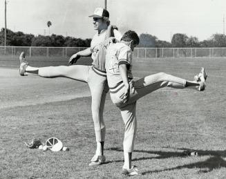 Rites of spring as practiced by the Toronto Blue Jays include this waltz-me-around-again routine featuring Jay Schroeder and coach Jimmy Williams (24)(...)