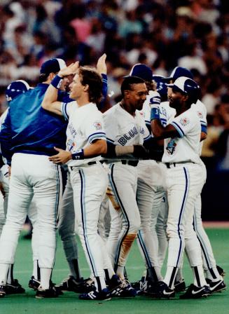The hero's hour: In the ninth inning, Roberto Alomar makes the Jays victors, and once again, right, the happy Jays are here again