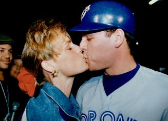 Getting his reward from wife Kristen is ed sprague after dramatic 9th-inning home run