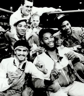 Canada's six gold medallists from the boxing competition team-up after completion of their events tonight