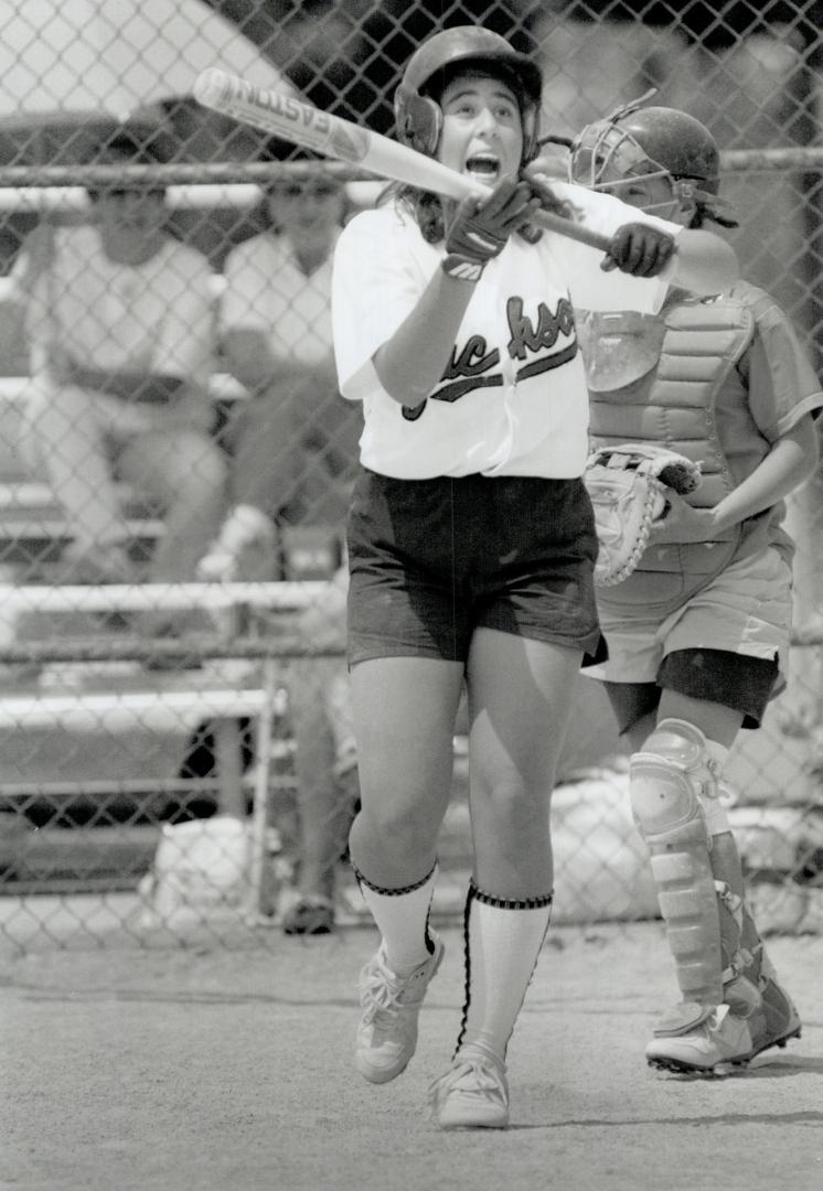 Pitched battle: A. Y. Jackson's Jacquel Cohen struck out in the Metro Invitational softball finals yesterday at Goulding Park. Her team, however, beat McLaughlin