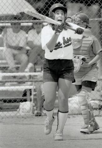 Pitched battle: A. Y. Jackson's Jacquel Cohen struck out in the Metro Invitational softball finals yesterday at Goulding Park. Her team, however, beat McLaughlin
