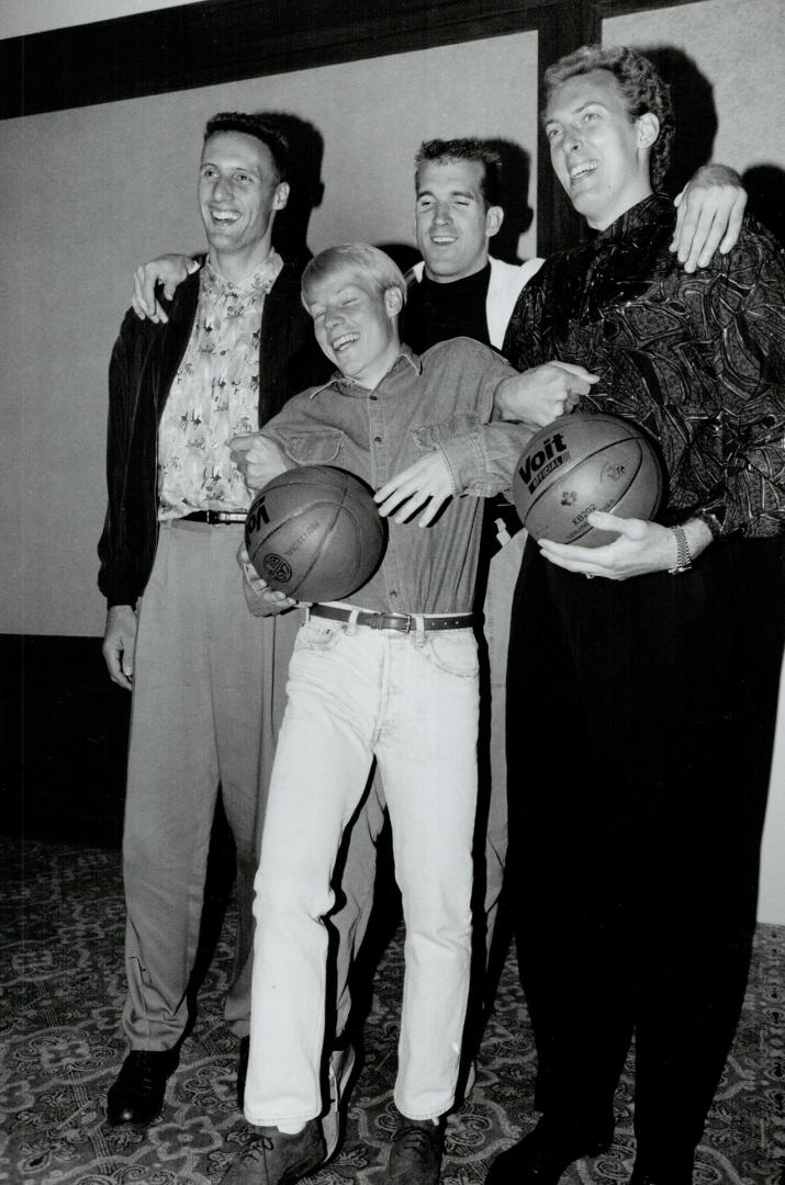 Hoops Team: National team members Ronn McMahon, front, Mike Smrek, left, Bill Wennington and Greg Wiltjer are getting ready to take on the world