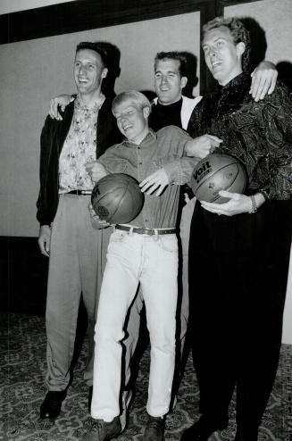 Hoops Team: National team members Ronn McMahon, front, Mike Smrek, left, Bill Wennington and Greg Wiltjer are getting ready to take on the world