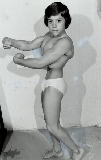 Strict discipline: Garret Walsh has a tough training regimen that has resulted in a body and posing technique admired by body-building officials