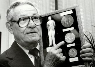 It was another world . . . Horace (Lefty) Gwynne treasures the mementos of six decades ago: The Olympic gold medal he won in Los Angeles, alongside ot(...)
