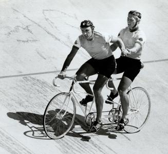 Jocely Lovell (front) and Gordon Singleton congratulate each other after winning the semi final against Australia in the tandem sprint