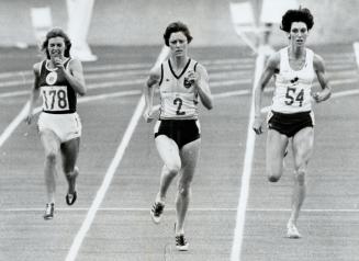 Women 200 metre final. Denise Boyd (2) of Australia wins in 22.82. She is flanked by Helen Golden (178) of Scotland (6th) and Patty Loverock ($54) of Canada (7th)