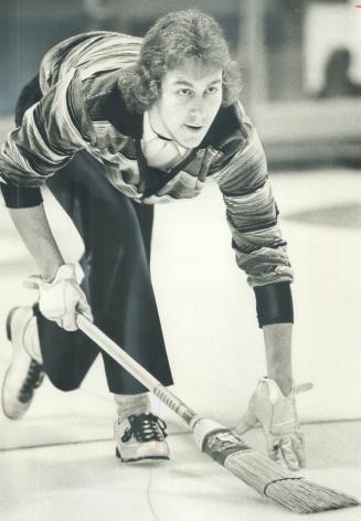 Youthful skip Pierre Birkbeck of Avonlea watches his rock-head down the ice during play in the Canada Life bonspiel