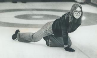 On target? Glenna MacKenzie of the terrace Club checks out her rock in the Imperial Life mixed curling bonspiel yesterday. MacKenzie was competing at (...)