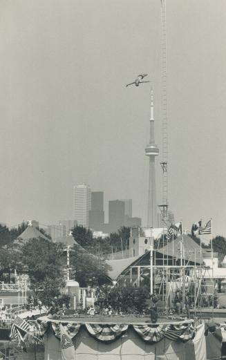 U.S. high divers go off deep end at Ontario Place. Two divers, above, clown around yesterday at Ontario Place, while a third takes the plunge from the(...)