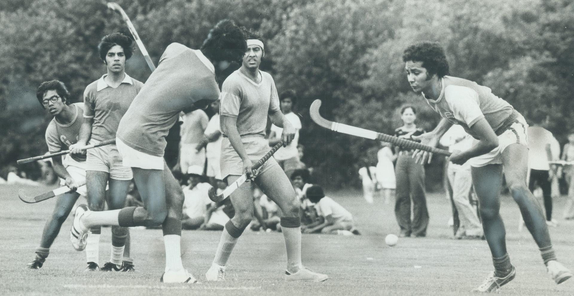 In field Hockey action at Sunnybrook Park, the Goan Overseas Association (in white shorts) battles the Falcons, in one of the many amateur leagues tha(...)
