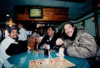 It's cricket: Watching World Cup at Scarborough's Benab West Indian Restaurant, from left, Terry Ramnarine, Prem Ramkissoon, and John