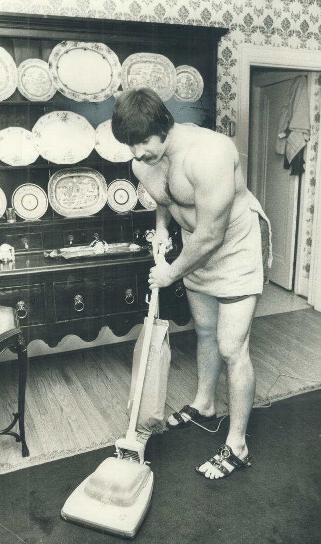 Ron Curl takes his turn at tidying up around the house