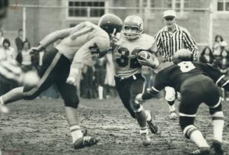 Marcello Oliverio (left) of Oakwood Barons appears ready to tackle teammate Mike Scuglia in TSSAA senior football game at Oakwood yesterday. Scuglia s(...)