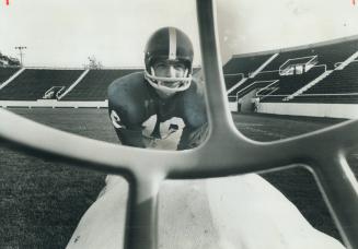 An opponent's view of varsity quarterback Vic Alboini, key to season's football hopes for blues