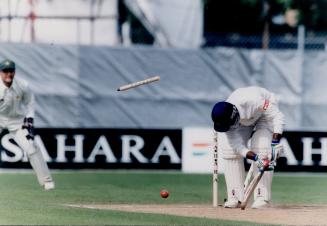 Chopping wood: The stumps fly yesterday as India's Saba Karim is bowled by Pakistan's Azhar Mahmood, but the joy was shortlived as India posted an easy win