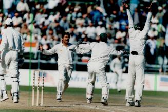 Big out: India's Mohammad Azharuddin, left, departs after being caught out by Pakistan's Inzamam ul-Haq, right, as bowler Mushtaq Ahmed, second from left, and wicketkeeper Moin Khan, celebrate