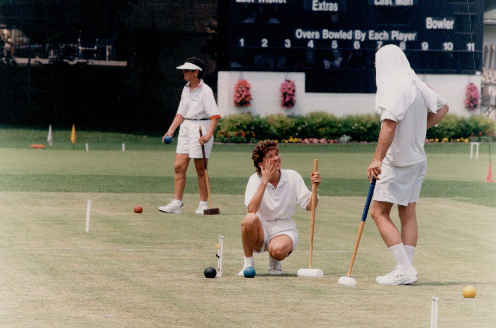 Having a ball: Christine Jones, left, and Don Oakley chat during a break in play at the Canadian Open Croquet Championships at the Toronto Cricket Club
